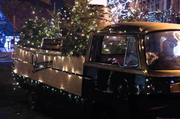 classic brown single cab truck with christmas tree